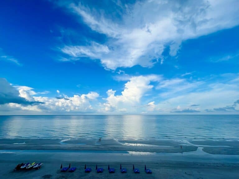a view of the ocean from a beach